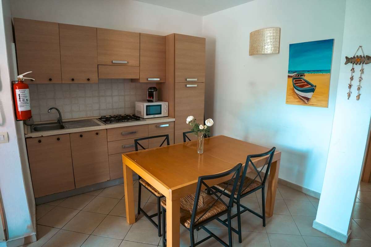 Casa Laranja · cozinha totalmente equipada
